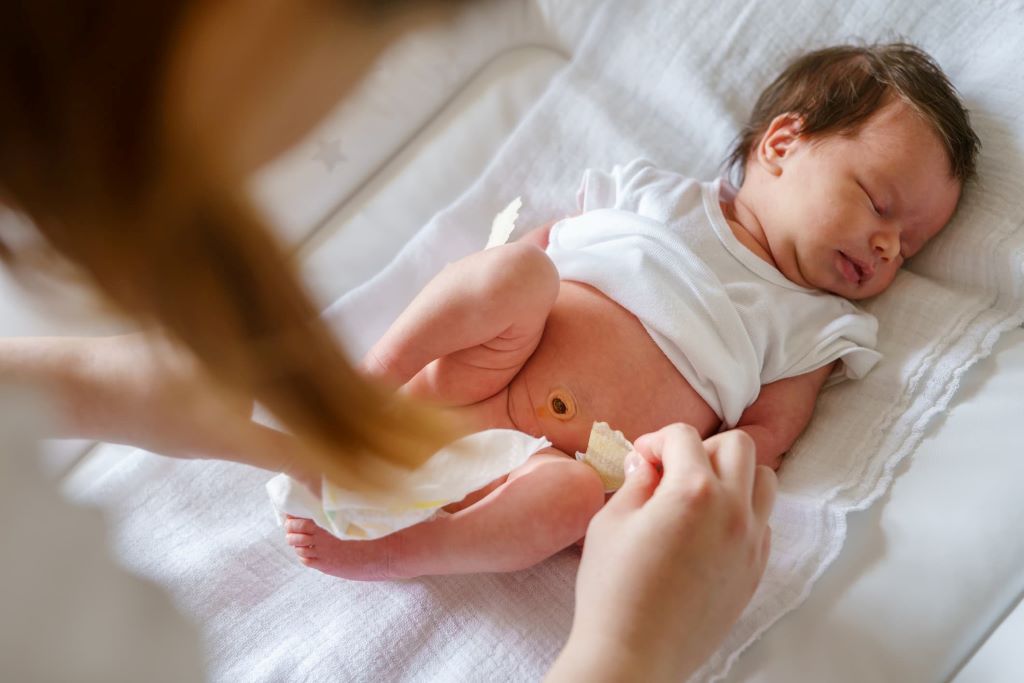 Should you lift baby's legs when changing diaper