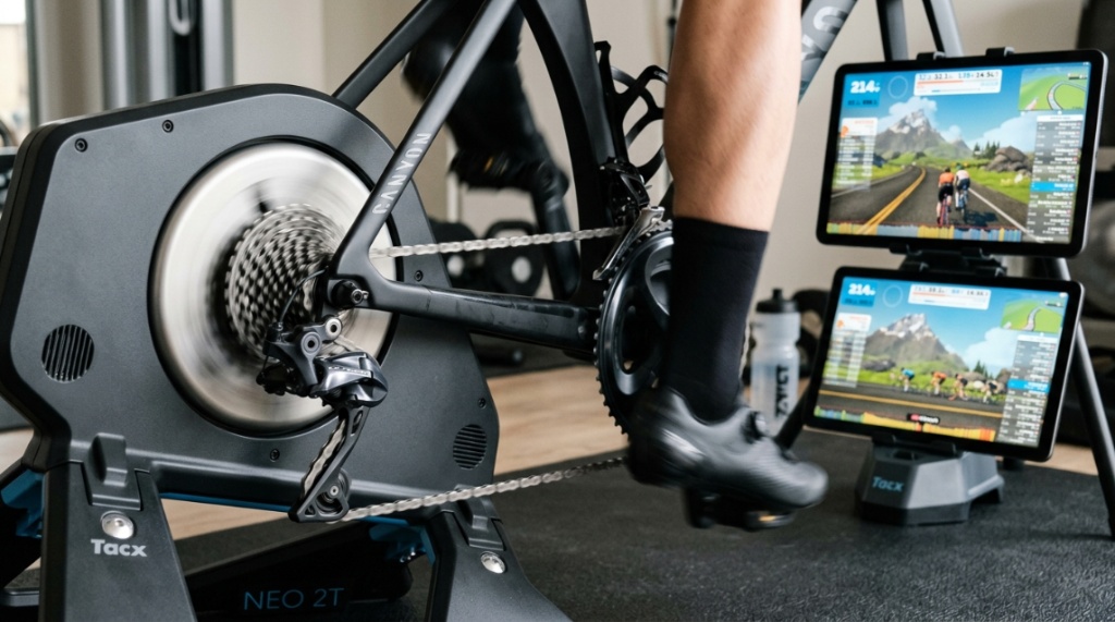 Road bicycle mounted onto a direct drive smart trainer for virtual indoor racing.